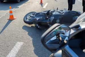 Crashed motorcycle and cones