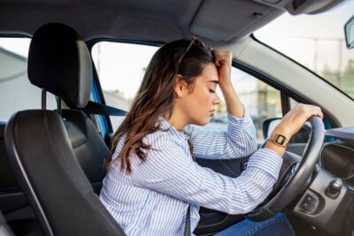 Drunk driving woman stressing over an accident