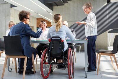 Meeting with woman in a wheelchair