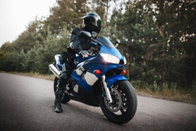 Motorcycle rider preparing to ride scaled