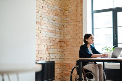 Woman working in a wheelchair