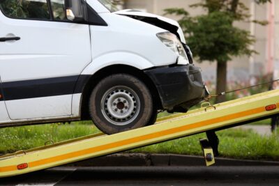 Crashed truck being loaded on a tow truck