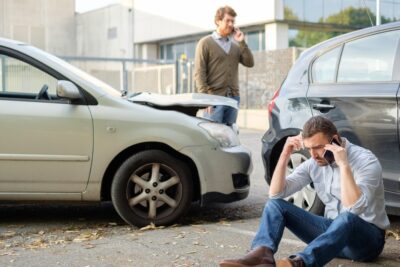 Men calling for help after rear end collision