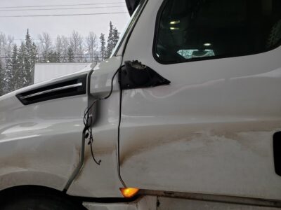 Smashed in white truck