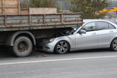 Truck crushing a sedan