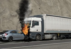 Truck going on fire after crashing with a car scaled