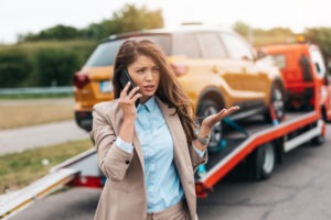 Woman calling for help after a truck crash