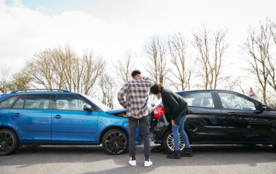 Young drivers looking over rear end crash