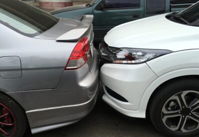 White and grey cars in a crash