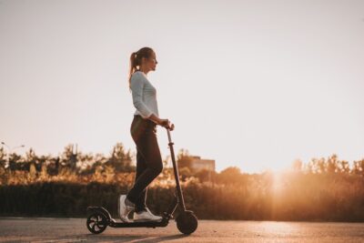 Woman riding an electric scooter