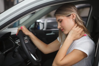 Blonde woman with whiplash scaled