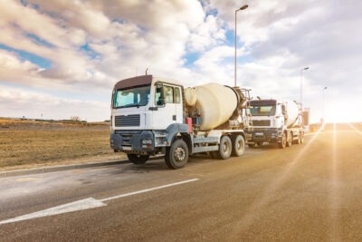 Cement mixer on a highway scaled