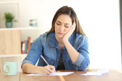 Woman working on a demand letter