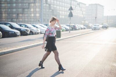 Woman jaywalking