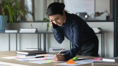 Woman on phone with insurance company