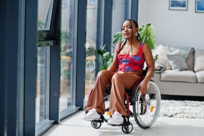 Black woman in wheelchair scaled