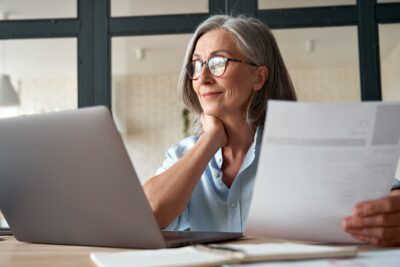 Older woman filing an insurance claim