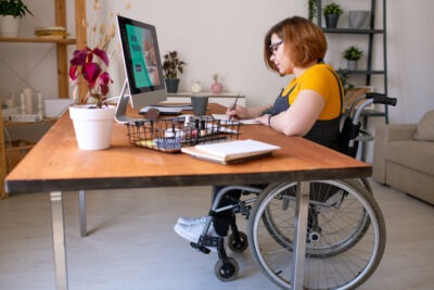 Young disabled woman in wheelchair