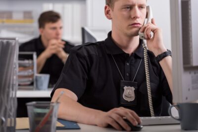 Officer taking police report over the phone