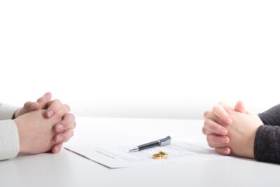 Client and lawyer sitting across from each other