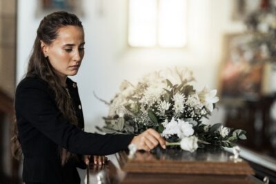 Woman at funeral wonders can a family member sue for wrongful death after car accident