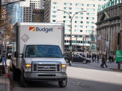 budget truck on the side of the road