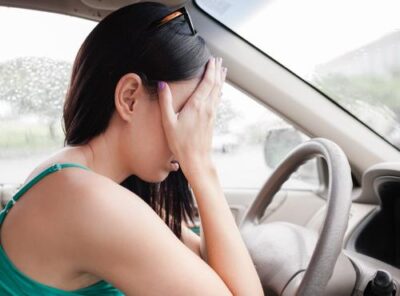 A woman in a car crash. Learn if you can sue someone personally after a car accident and how a lawyer can help.