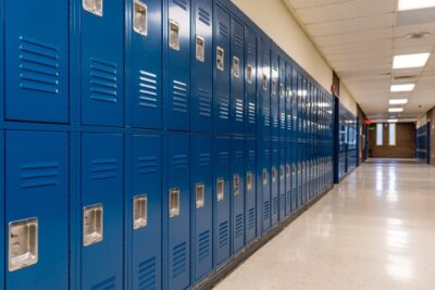 Empty school hallway. What parties can be held liable for school sexual abuse?