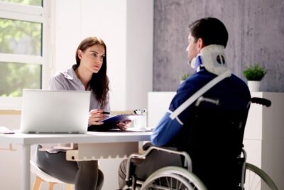 An attorney speaks with her client who asks, “Can I quit my job while on workers’ comp?” after sustaining spinal cord injuries while at work.