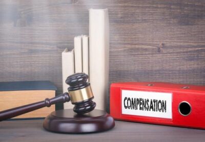 A gavel and several books. Find out what the statute of limitations is for workers’ compensation in Georgia with a legal professional.