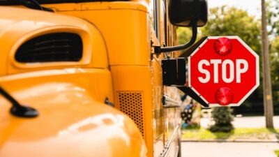 Yellow school bus stop sign. Can a school be held responsible for a sexual assault?